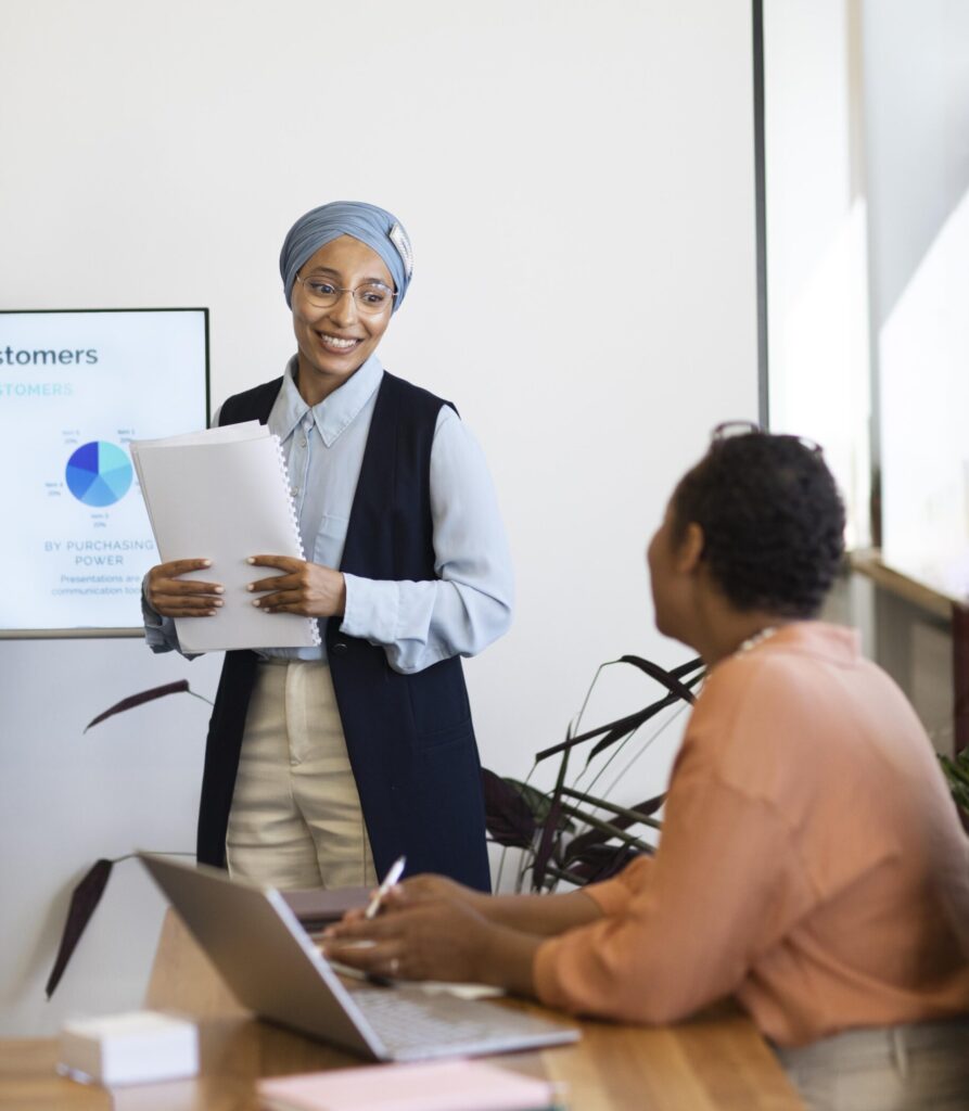 female-trainers-office-job-prepare-session-with-new-employee